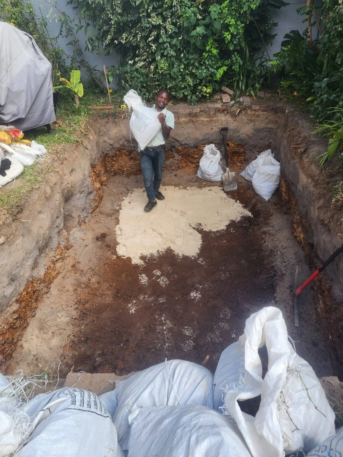 Ishmael Nkhata on site during a fibreglass pool installation